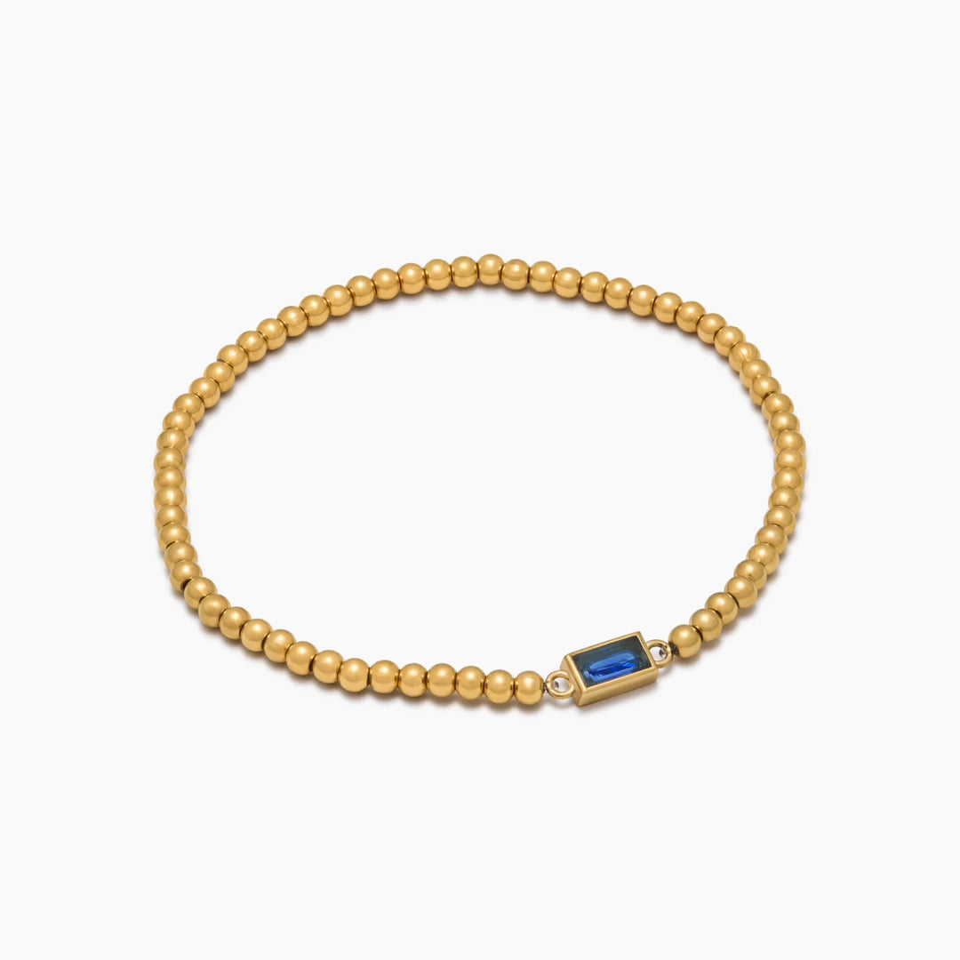 BRACELET EN PERLES D'OR AVEC PIERRES DE NAISSANCE