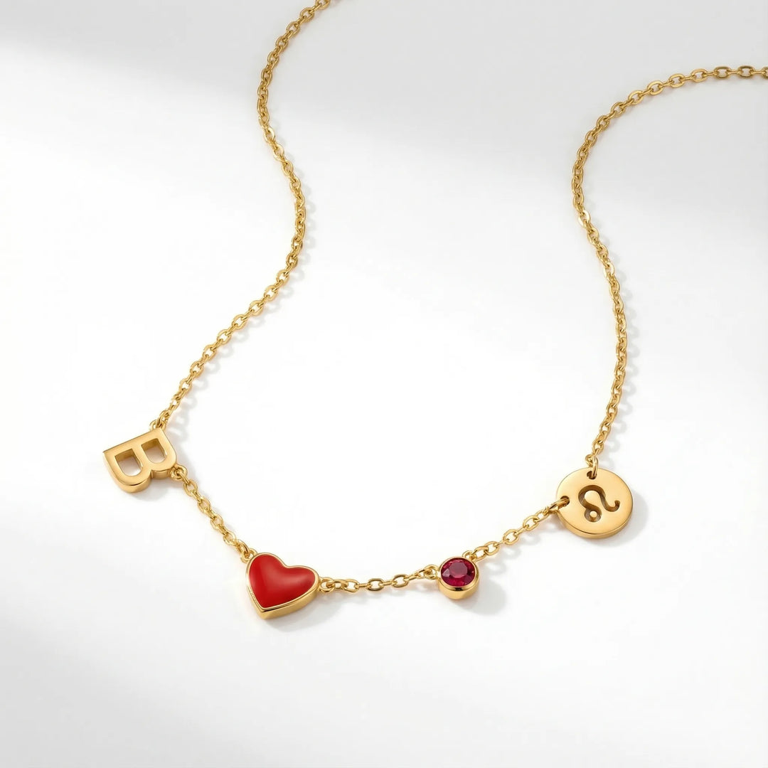 COLLIER AVEC INITIALE EN FORME DE CŒUR